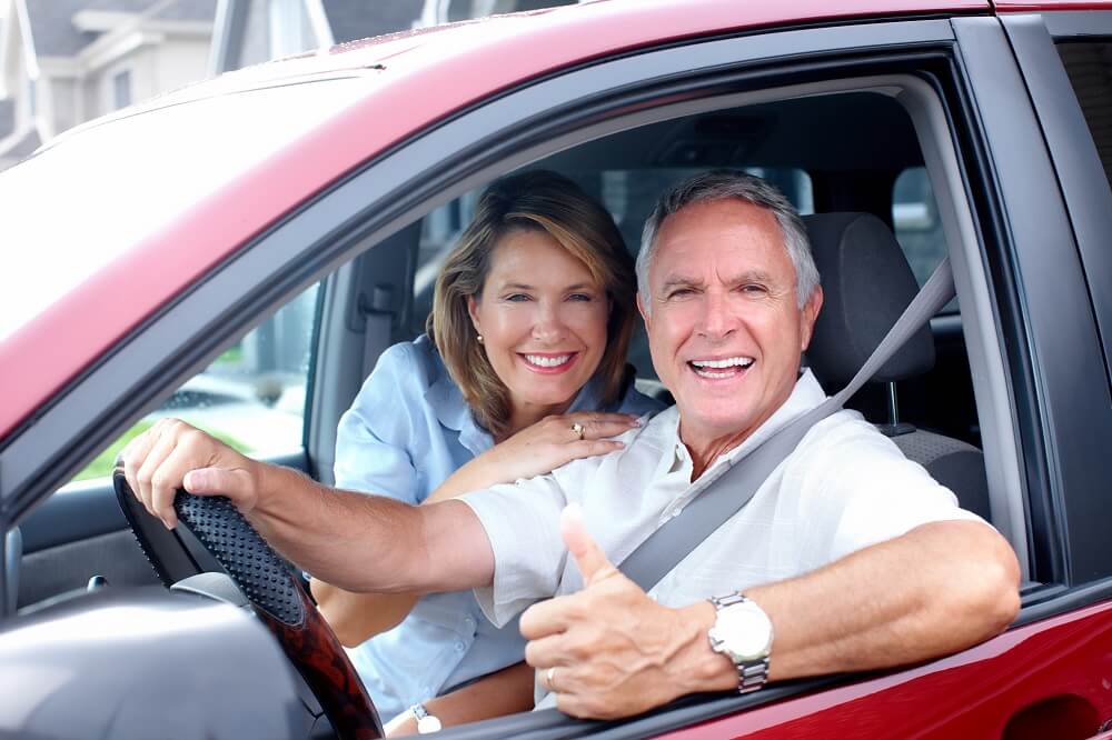 older couple driving opt