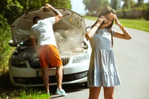 young couple traveling car sunny day 2 300x200 1